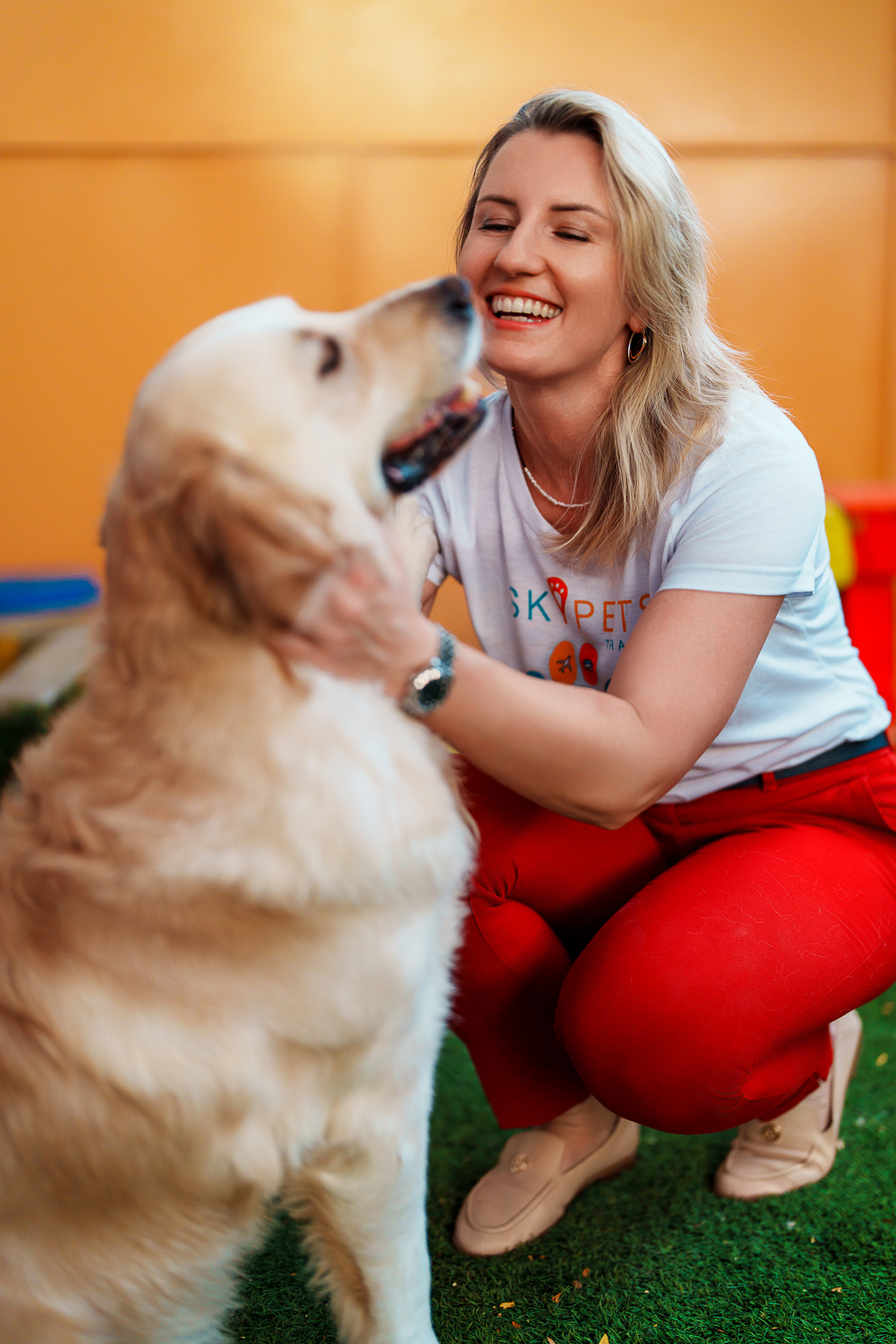 SkyPets Travel team member caring for a dog